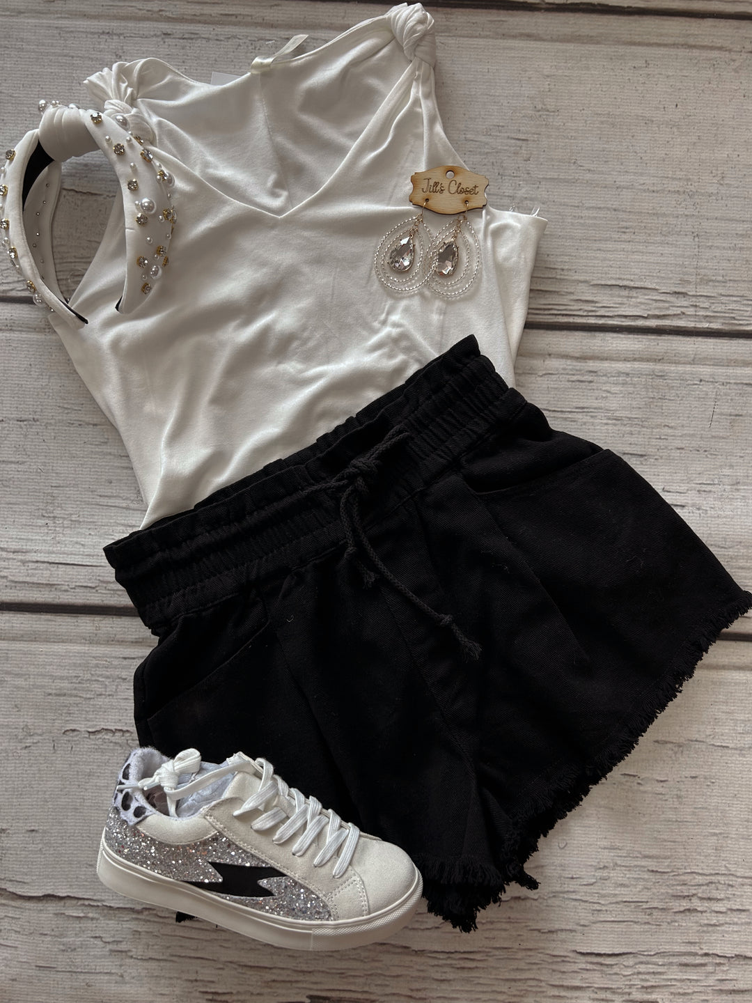 black fringed hem shorts