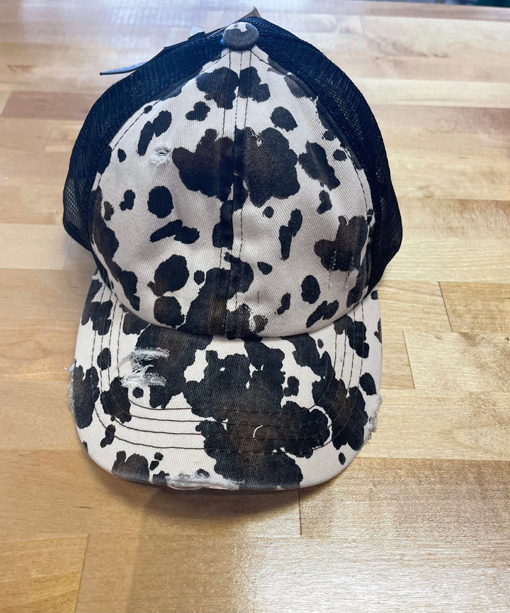 Cowprint distressed trucker hat