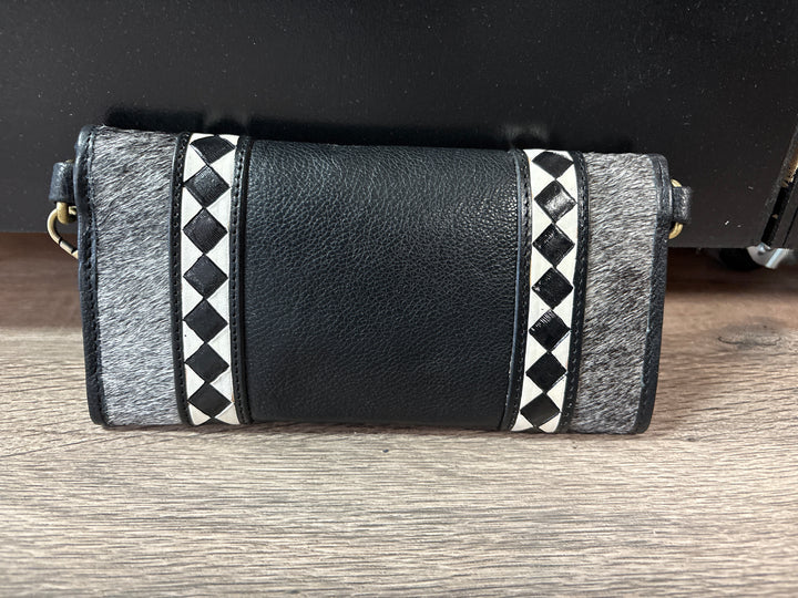 Checked Out Leather Bags