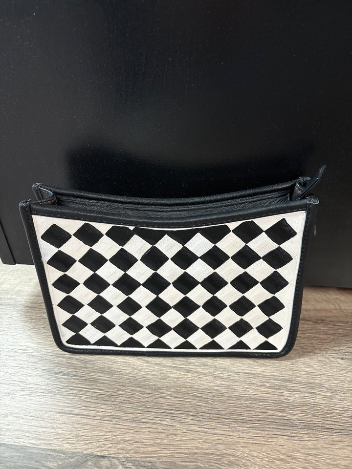 Checked Out Leather Bags