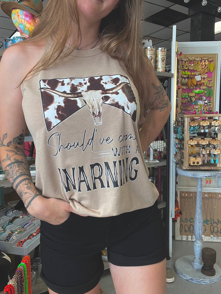 Tan warning label tank