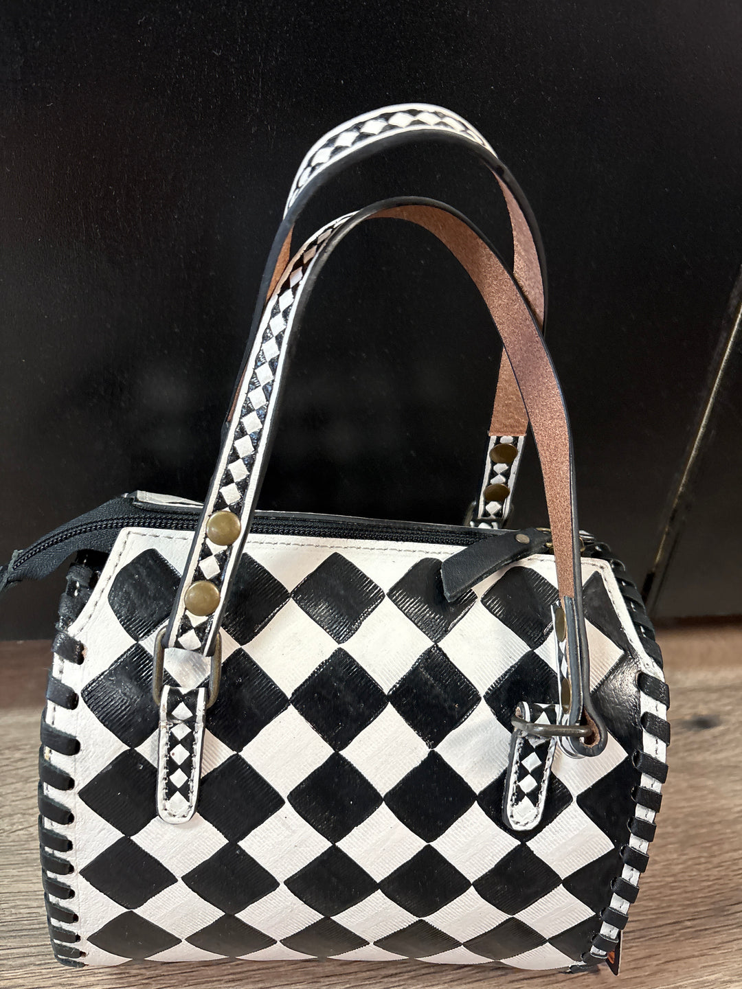 Checked Out Leather Bags