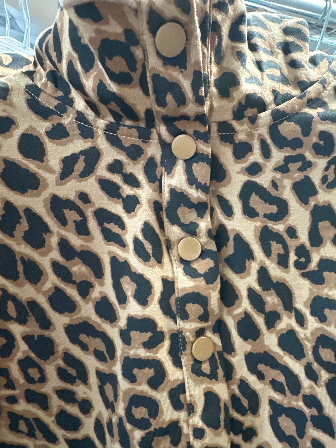 leopard print knit top with scolloped hem