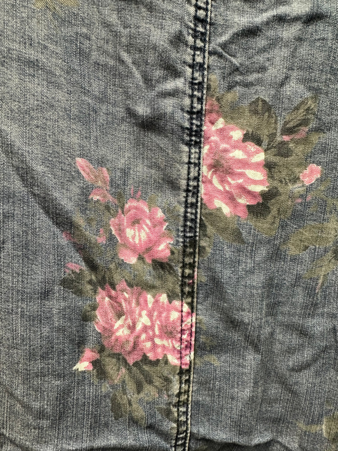 this denim blue ruffled chambray kimono is printed with pink rose florals