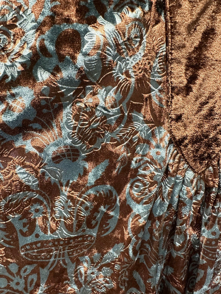 Long sleeved V neck top with brown placket and a teal and brown printed top