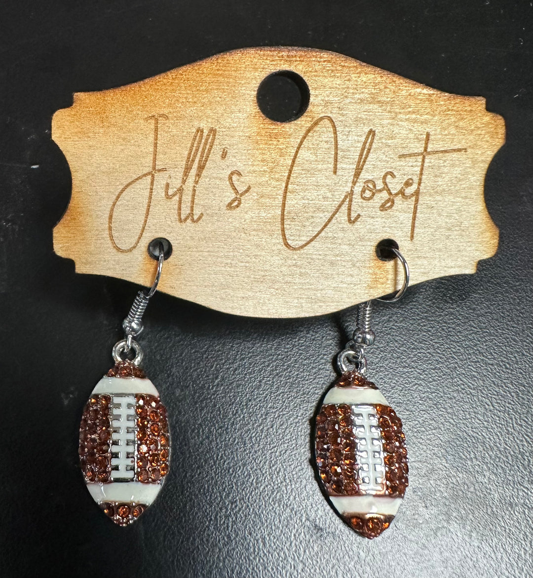 Fish hook wires dangle football earrings