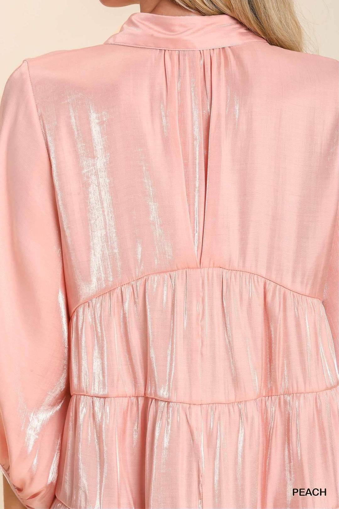 The peach shimmery Anna top